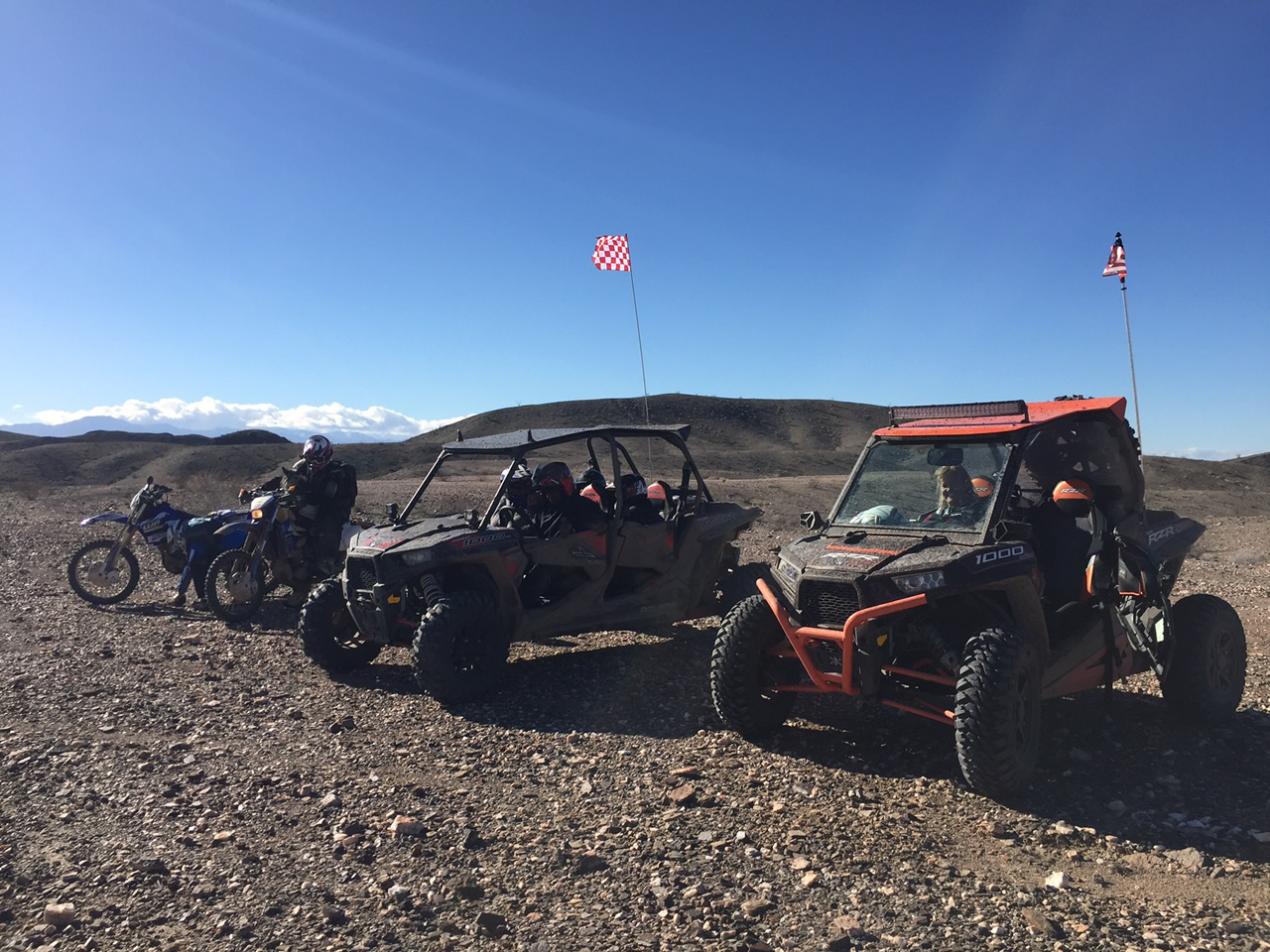 Two motorcycles and two ATV's ready to roll at Glamis North Hot Springs Resort